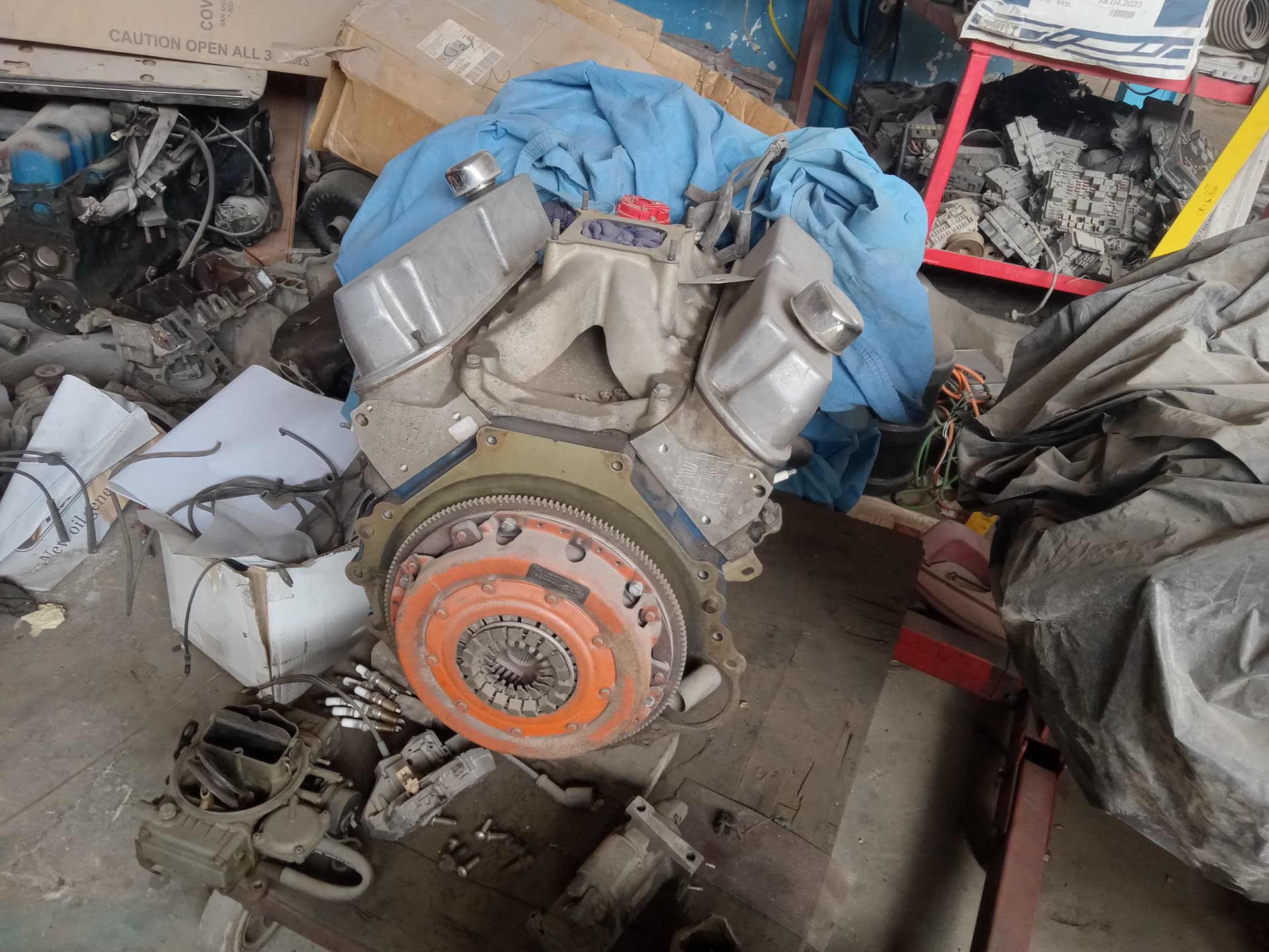 Classic V8 engine and clutch assembly during an automotive electrical integration project supported by PSS.
